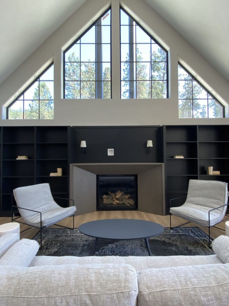 Medium grey tapered cast stone fireplace surround in lower kelowna mission show home