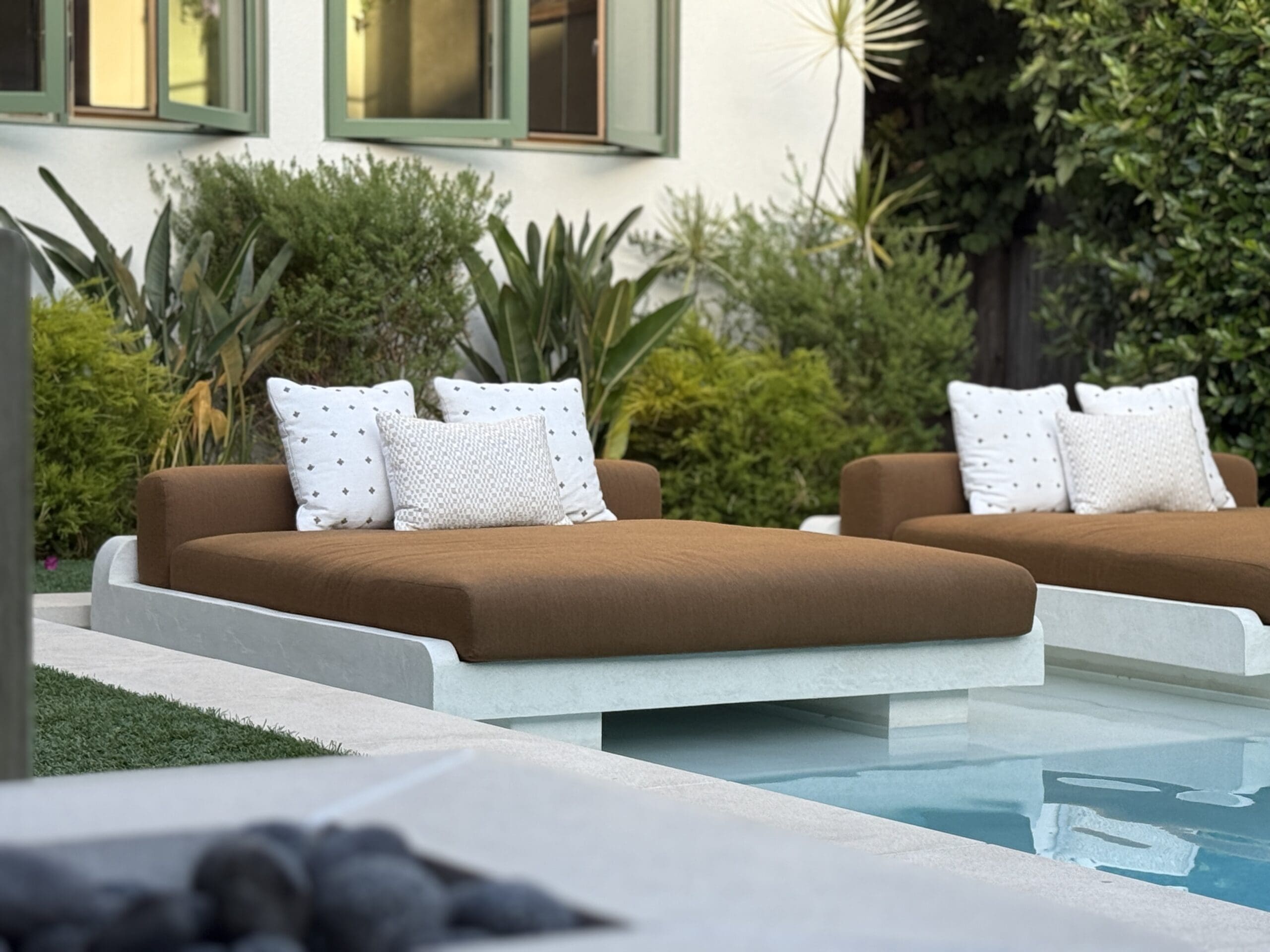 Modern custom concrete daybed with cushions – luxury outdoor concrete furniture